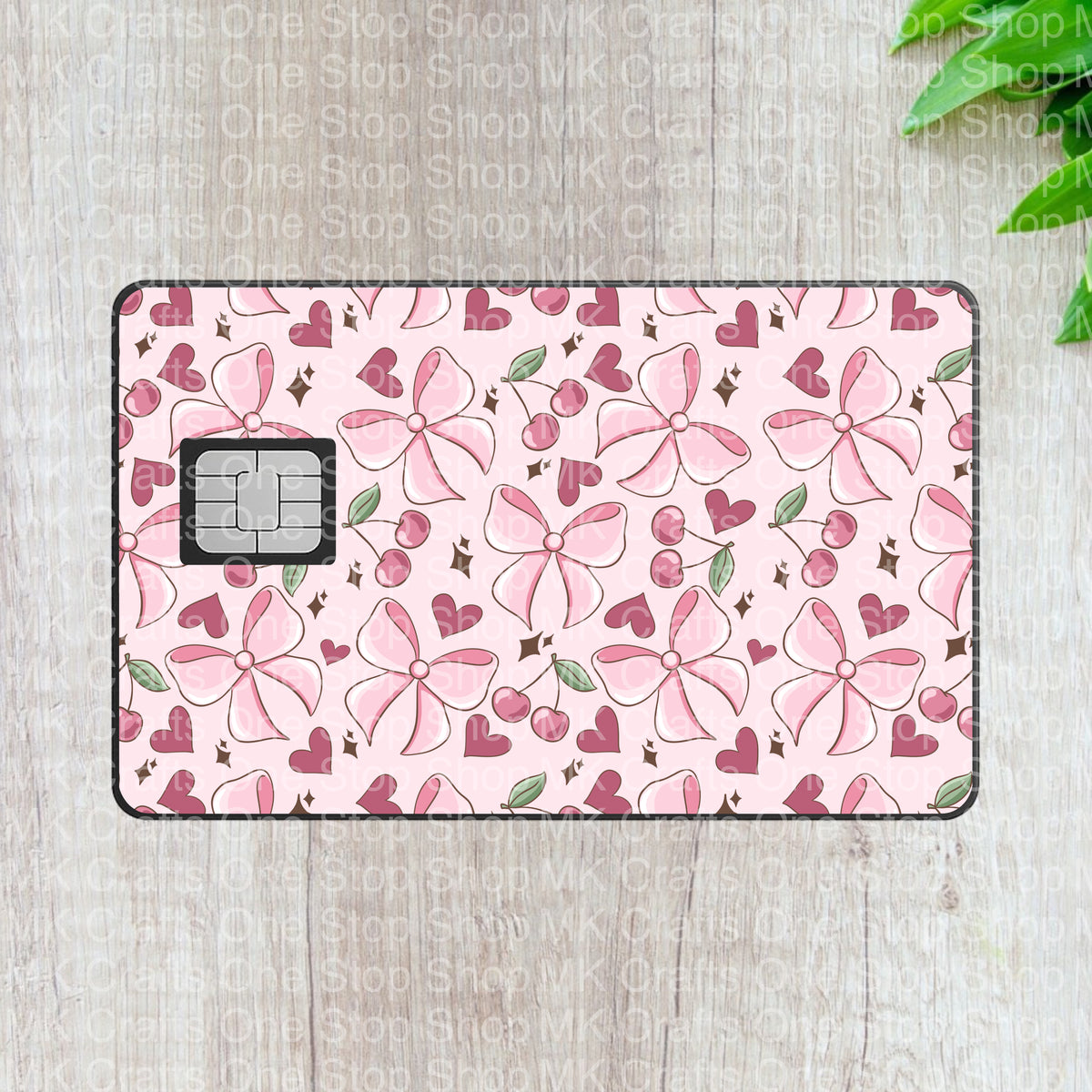 Valentine's Day Pink Hearts and Bows UV DTF Credit Card Cover (CC-095) shown on a card